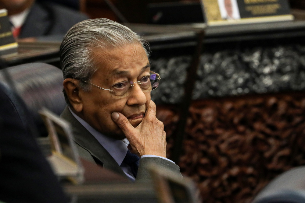 Former Prime Minister Tun Dr Mahathir Mohamad reacts during a session of the lower house of parliament, in Kuala Lumpur, Malaysia July 13, 2020. u00e2u20acu201d Reuters pic 
