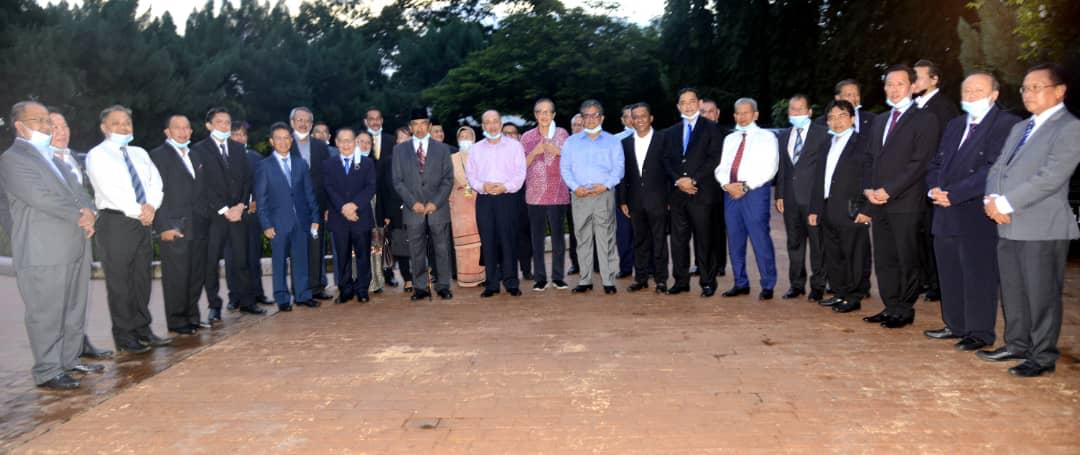 Tan Sri Musa Aman (centre) is seen with some 32 assemblymen who gathered at his residence in Kota Kinabalu for a press conference on July 29, 2020.