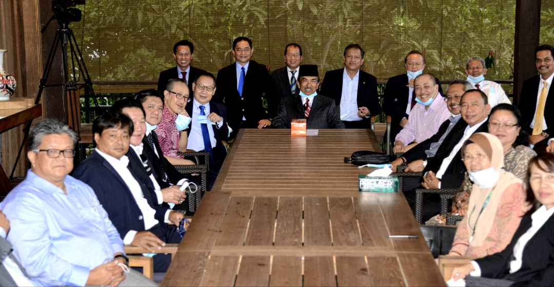 Tan Sri Musa Aman (centre) addresses media personnel during a press conference at his home in Kota Kinabalu July 29, 2020. 