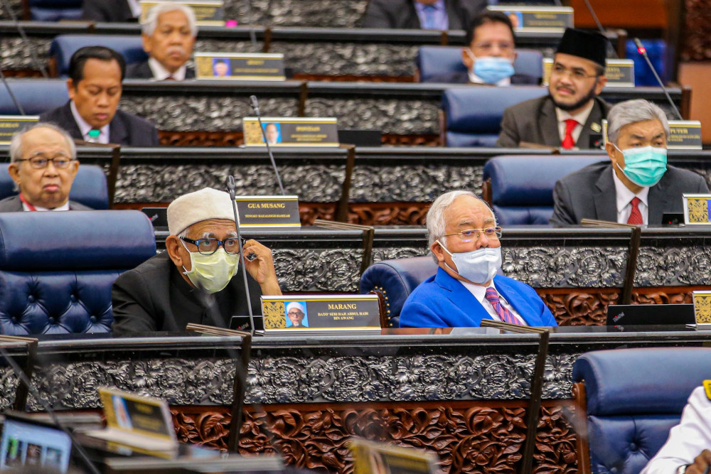 Pekan MP, Datuk Seri Najib Razak and Marang MP, Datuk Seri Abdul Hadi Awang are pictured during the second meeting of the third session of the 14th Parliament in Kuala Lumpur July 13, 2020. u00e2u20acu201d Picture by Hari Anggara