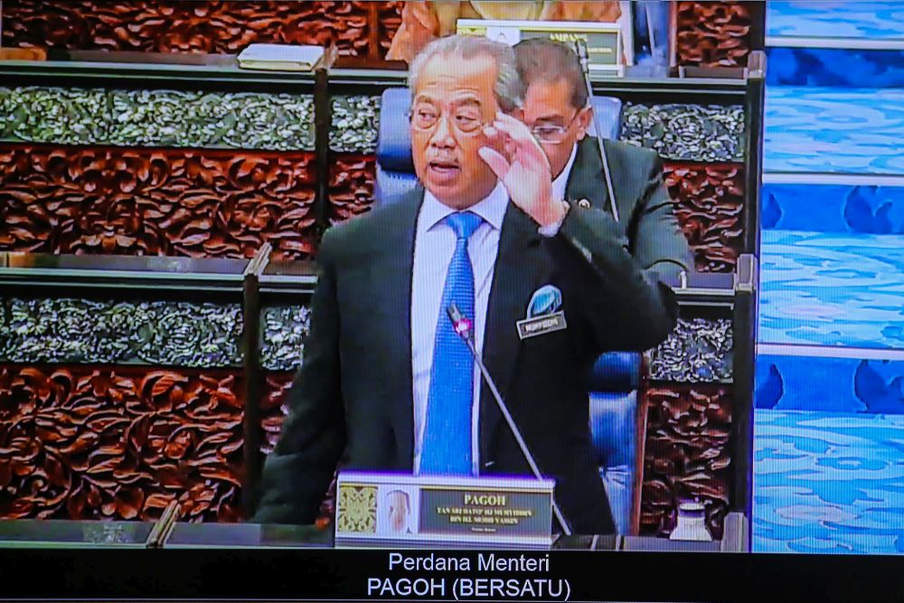 Prime Minister Tan Sri Muhyiddin Yassin delivers his speech during the second meeting of the third session of the 14th Parliament during a live broadcast in Kuala Lumpur July 13, 2020. u00e2u20acu201d Picture by Hari Anggara