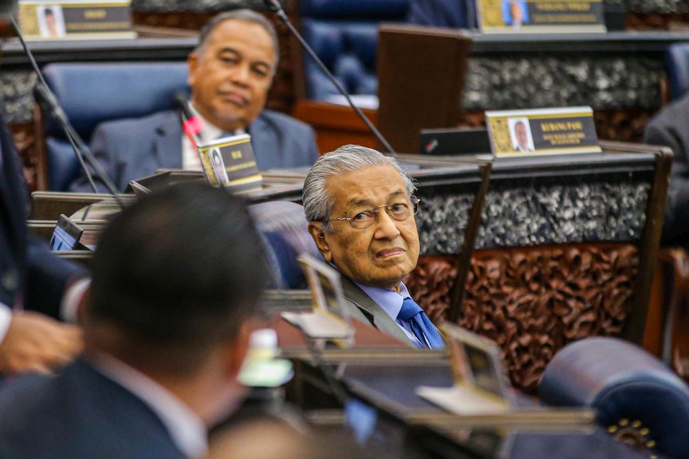 Langkawi MP Tun Dr Mahathir Mohamad is pictured during the second meeting of the third session of the 14th Parliament in Kuala Lumpur July 13, 2020. u00e2u20acu201d Picture by Hari Anggara