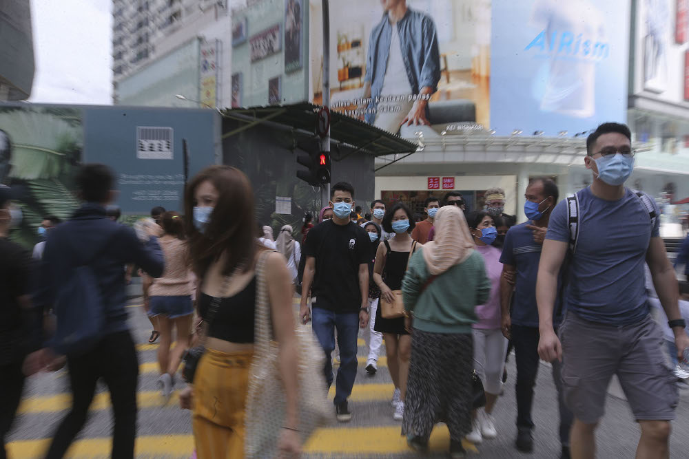 Pedestrians wearing face masks at a public area in Kuala Lumpur August 2, 2020. u00e2u20acu201d Picture by Hari Anggara  