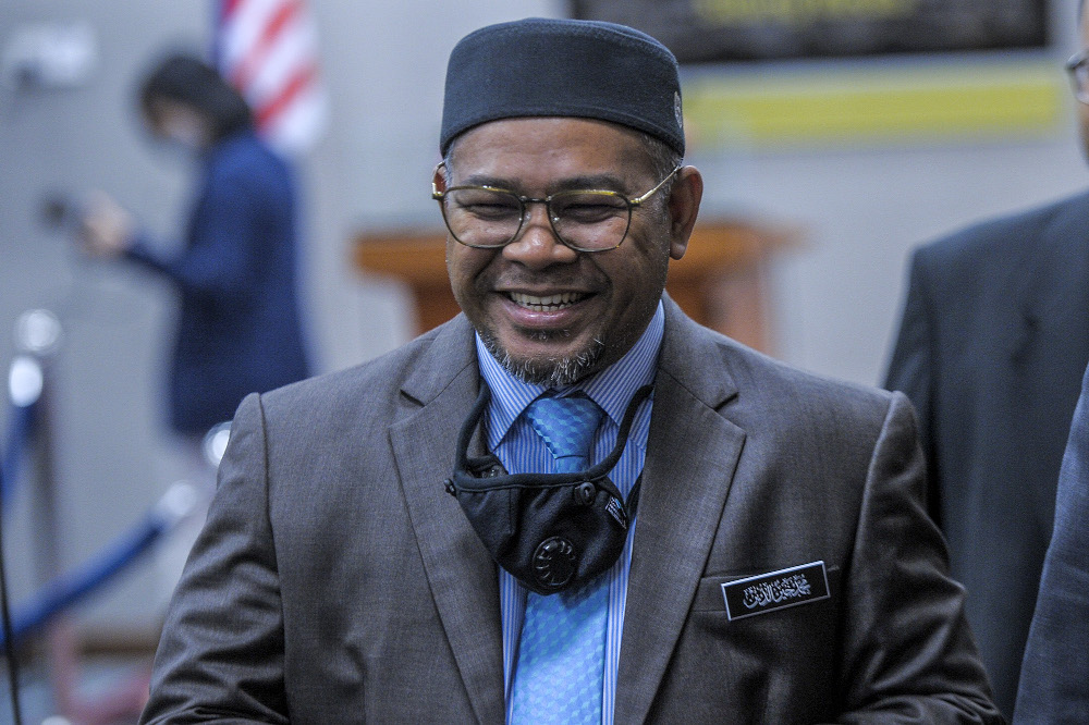 Minister of Plantation Industries and Commodities Datuk Mohd Khairuddin Aman Razali speaks to reporters during a press conference in Parliament on August 5, 2020. u00e2u20acu201d Picture by Shafwan Zaidon