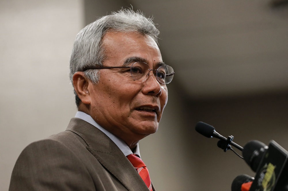 Minister in the Prime Ministeru00e2u20acu2122s Department Datuk Seri Mohd Redzuan Md Yusof speaks to reporters at the Parliament building August 10,2020. u00e2u20acu201d Picture by Ahmad Zamzahurinn