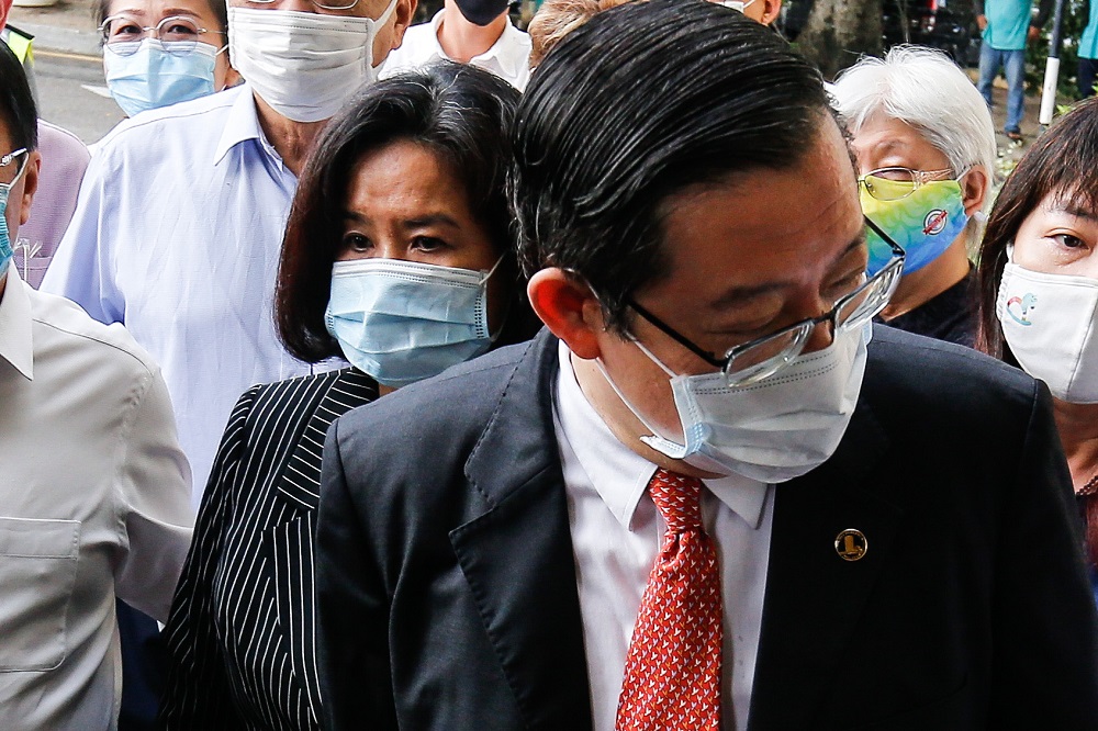 Former Penang chief minister Lim Guan Eng and his wife Betty Chew arrive at the Butterworth courthouse August 11, 2020. u00e2u20acu201d Picture by Sayuti Zainudin