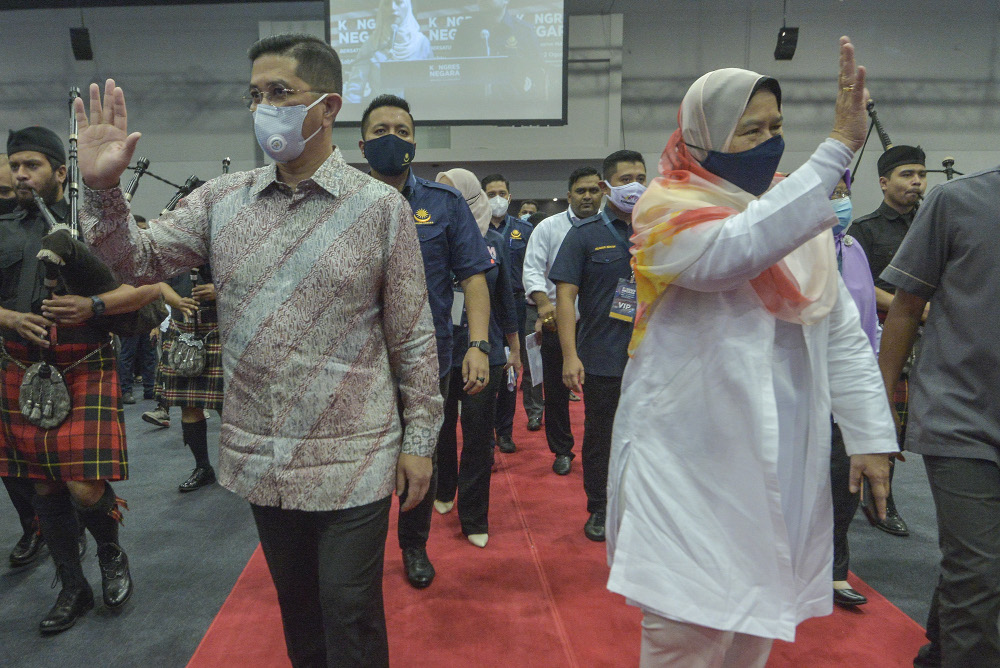 Datuk Seri Azmin Ali and Zuraida Kamaruddin arrive during the National Congress: Unite For Malaysia event at Malaysia International Trade & Exhibition Centre (MITEC) in Kuala Lumpur, August 22, 2020. u00e2u20acu201d Picture by Shafwan Zaidon