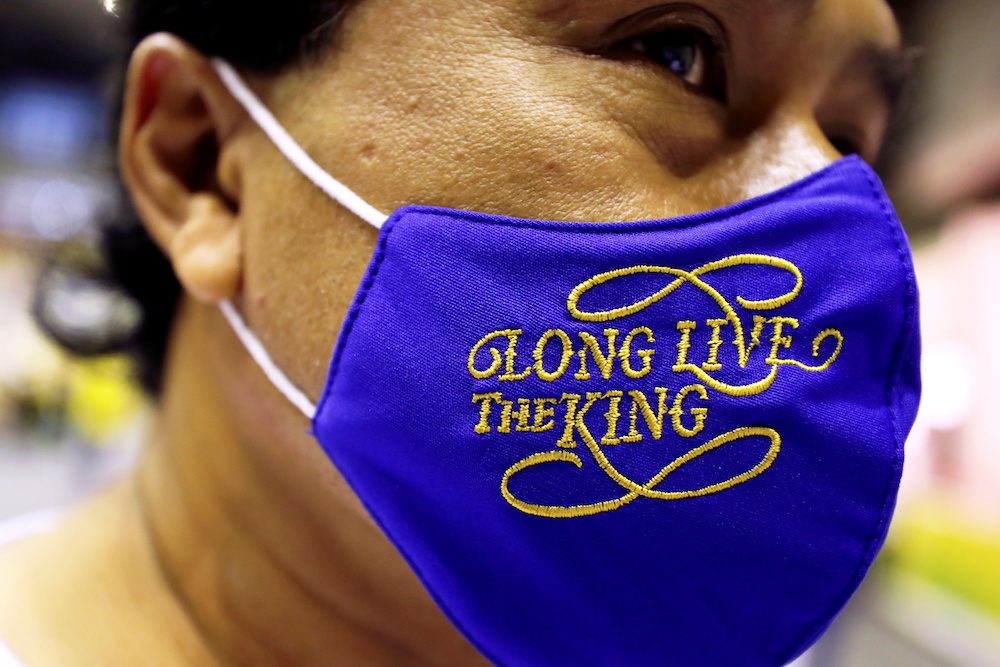A person wears a protective mask with writing on it as members of Thai right-wing group 'Thai Pakdee' (Loyal Thai) attend a rally in support of the government and the monarchy in BangkokAugust 30, 2020. u00e2u20acu201d Reuters pic