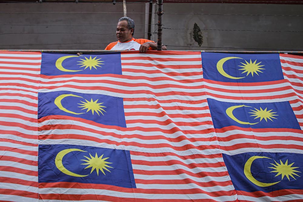 Malaysia flags are put up in conjunction with Merdeka celebrations at Kampung Baru low-cost flats, August 30, 2020. u00e2u20acu201d Picture by Hari Anggara