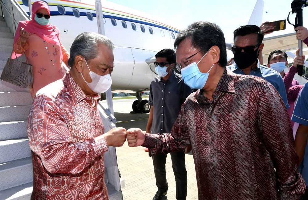 Prime Minister Tan Sri Muhyiddin Yassin was welcomed by Sabah Chief Minister Datuk Seri Mohd Shafie Apdal upon his arrival at the Kota Kinabalu International Airport August 29, 2020. u00e2u20acu201d Bernama pic