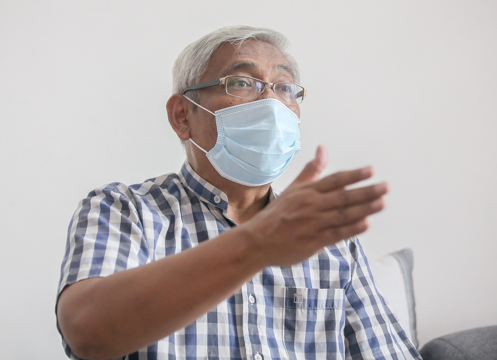 Perak DAP vice-chairman Abdul Aziz Bari speaks during a press conference at his home in Ipoh August 12, 2020. u00e2u20acu2022 Picture by Farhan Najib