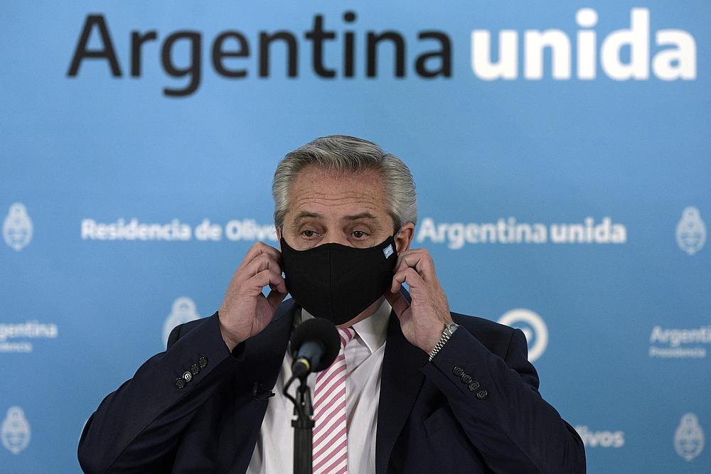 Argentina's President Alberto Fernandez gestures during the announcement that Argentina and Mexico will produce and distribute an experimental virus vaccine, in Buenos Aires, Argentina August 12, 2020. u00e2u20acu201d Pool pic via Reuters