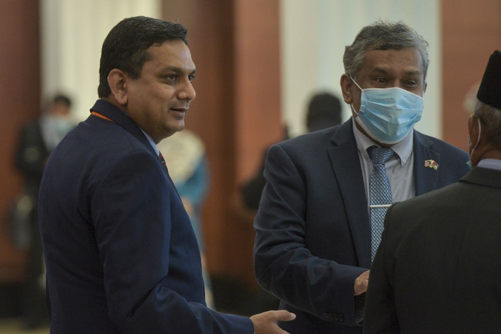 Deputy Minister of Federal Territories Edmund Santhara (left) is pictured in Parliament, Kuala Lumpur August 27, 2020. u00e2u20acu201d Picture by Shafwan Zaidon