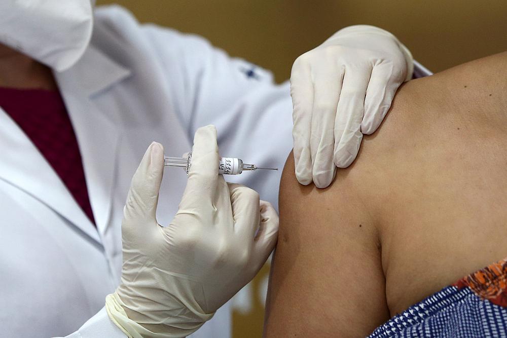 Nurse Isabelli Guasso administers China's Sinovac vaccine, a potential vaccine for Covid-19, to volunteer and nurse Fabiana Souza, in Porto Alegre, Brazil August 8, 2020. u00e2u20acu201d Reuters pic
