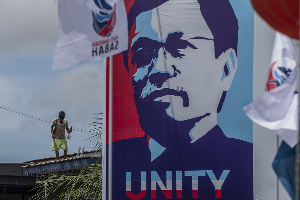 An election poster of Warisan president Datuk Seri Shafie Apdal is seen during the Sabah State Election campaign in Luyang, Sabah September 14, 2020. u00e2u20acu201d Picture by Firdaus Latif