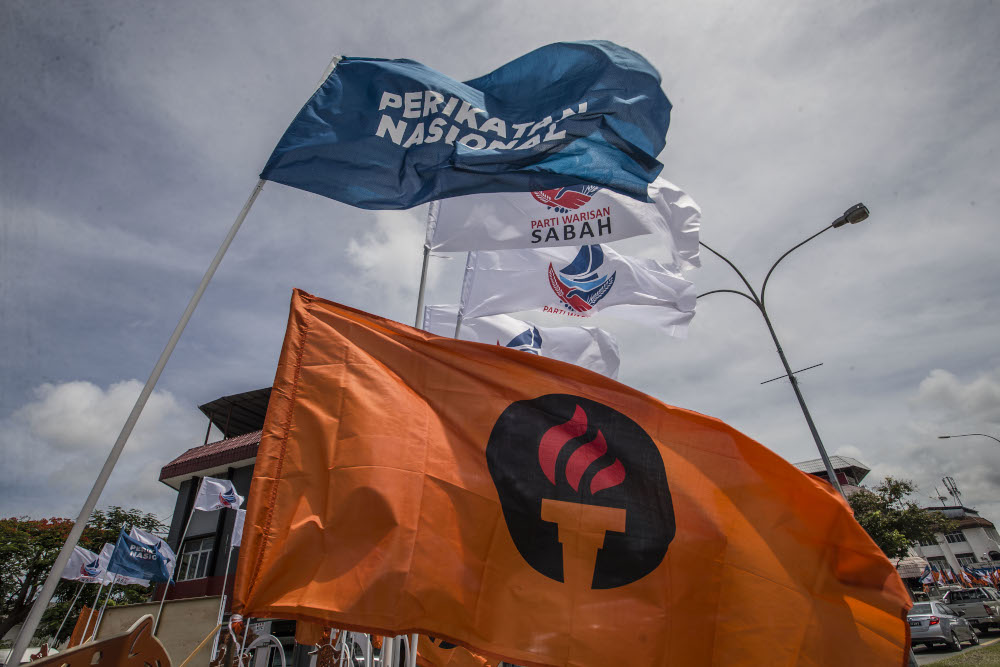 Party flags are seen during the Sabah state election campaign in Luyang, Sabah September 14, 2020. u00e2u20acu201d Picture by Firdaus Latif