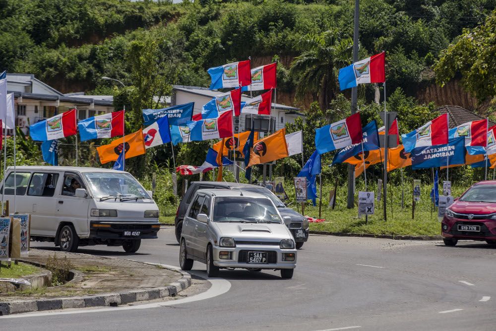 Party flags are seen during the Sabah state election campaign in Donggongon, Penampang, Sabah September 21, 2020. u00e2u20acu201d Picture by Firdaus Latif