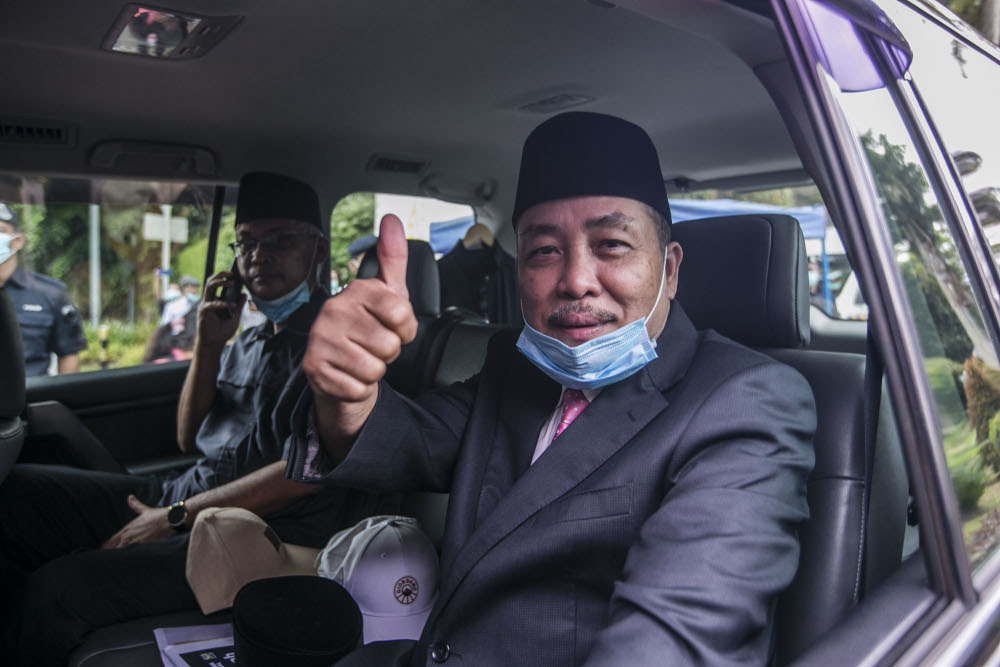 Sabah Bersatu chief Datuk Hajiji Noor speaks to reporters after an audience with the Yang di-Pertua Negeri Tun Juhar Mahiruddin at Istana Negeri, Kota Kinabalu September 27, 2020. u00e2u20acu201d Picture by Firdaus Latif