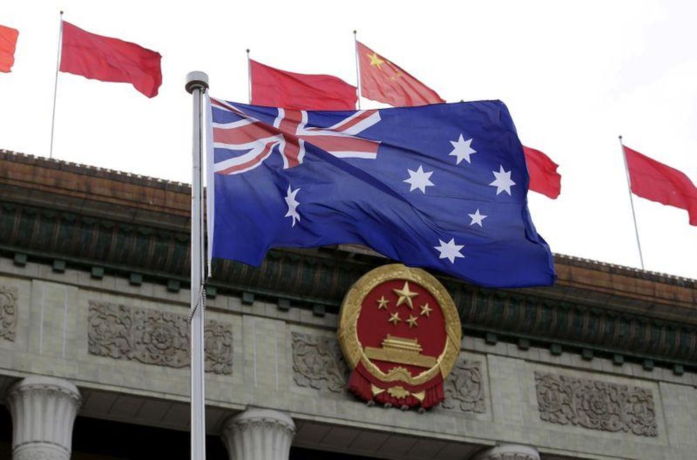 An Australian flag flutters in front of the Great Hall of the People during a ceremony in Beijing, China, April 14, 2016. u00e2u20acu201d Reuters pic