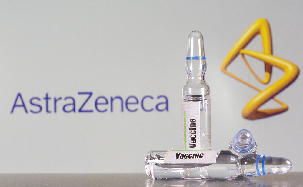 A test tube labelled with the Vaccine is seen in front of AstraZeneca logo in this illustration taken September 9, 2020. u00e2u20acu201d Reuters pic