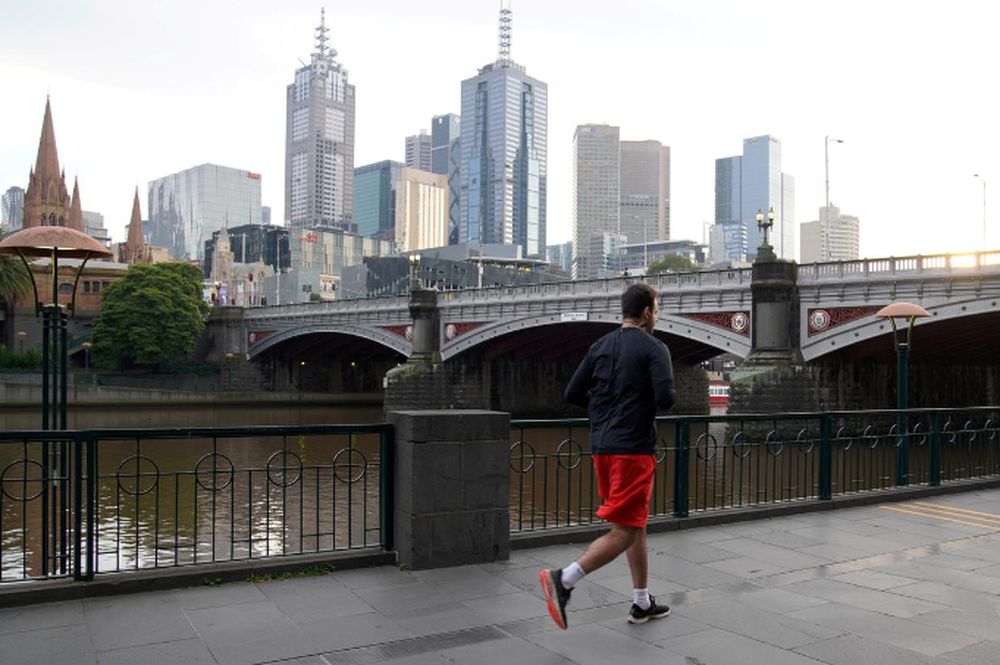 A solitary man runs along a waterway after lockdown restrictions were implemented in response to an outbreak of the coronavirus disease (Covid-19) in Melbourne, Australia, July 10, 2020. u00e2u20acu201d Reuters pic