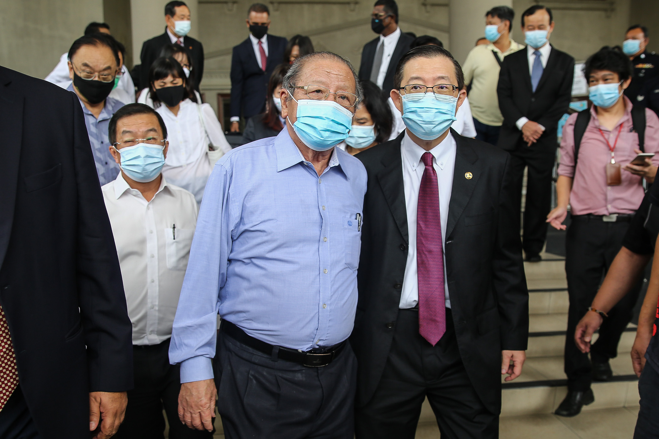 Former finance minister Lim Guan Eng (right) and his father Lim Kit Siang are pictured at the Kuala Lumpur High Court September 9, 2020. u00e2u20acu201d Picture by Yusof Mat Isa