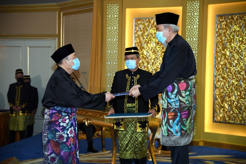 Datuk Hajiji Noor receives his letter of appointment as Sabah chief minister from the Yang di-Pertua Negeri Tun Juhar Mahiruddin at Istana Negeri, Kota Kinabalu September 29, 2020. u00e2u20acu201d Bernama pic