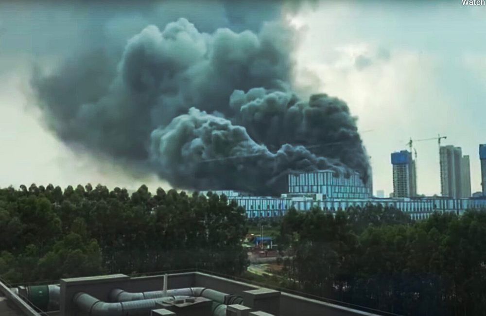 Image of a huge fire at an unfinished research facility belonging to tech giant Huawei in Dongguan, south China from YouTube.