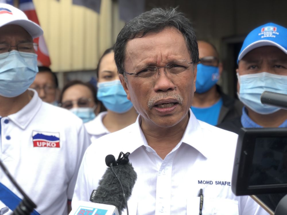 Parti Warisan Sabah president Datuk Seri Mohd Shafie Apdal speaks to reporters while campaigning in Kampung Lokub, Kota Kinabalu September 18, 2020. u00e2u20acu201d Picture by Emmanuel Santa Maria Chin