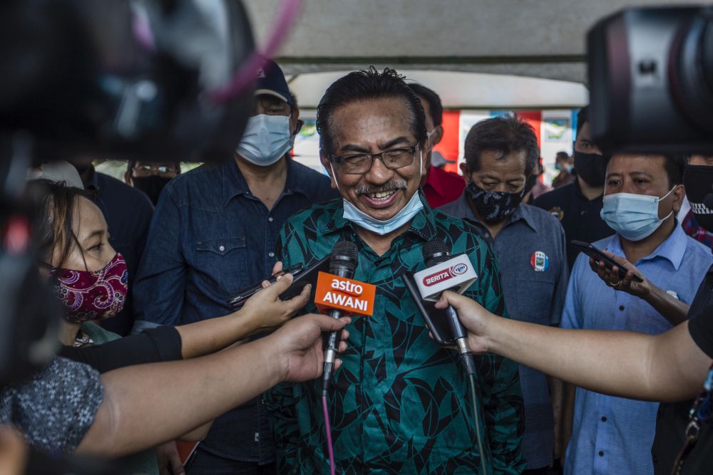 Former Sabah chief minister Tan Sri Musa Aman speaks to reporters while campaigning in Kiulu September 18, 2020. u00e2u20acu201d Picture by Firdaus Latif