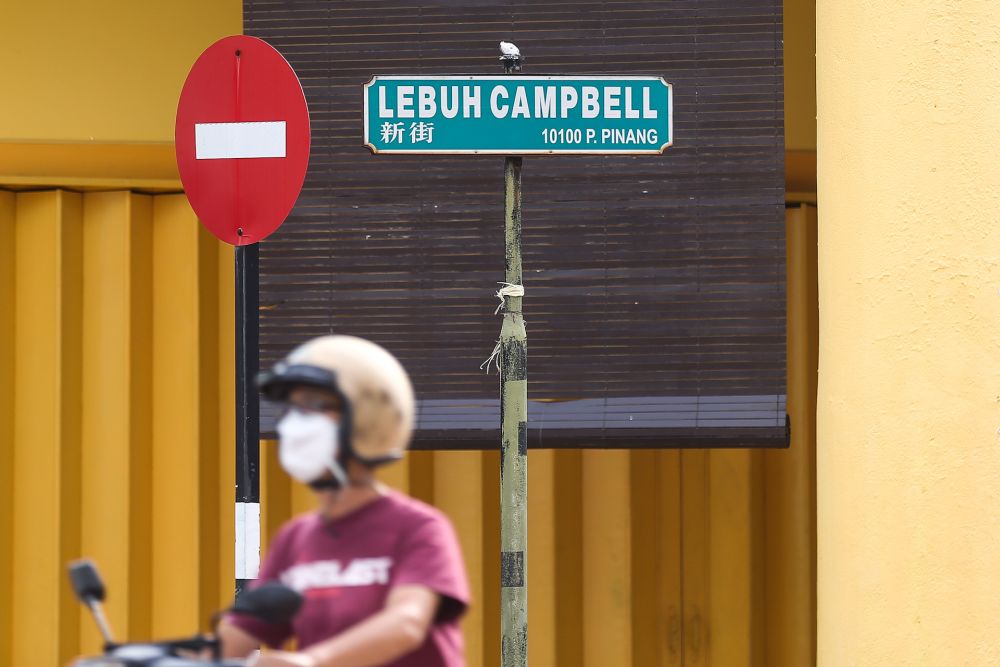 Chinese characters are pictured on several road signs in Penang September 1, 2020. u00e2u20acu2022 Picture by Sayuti Zainudin