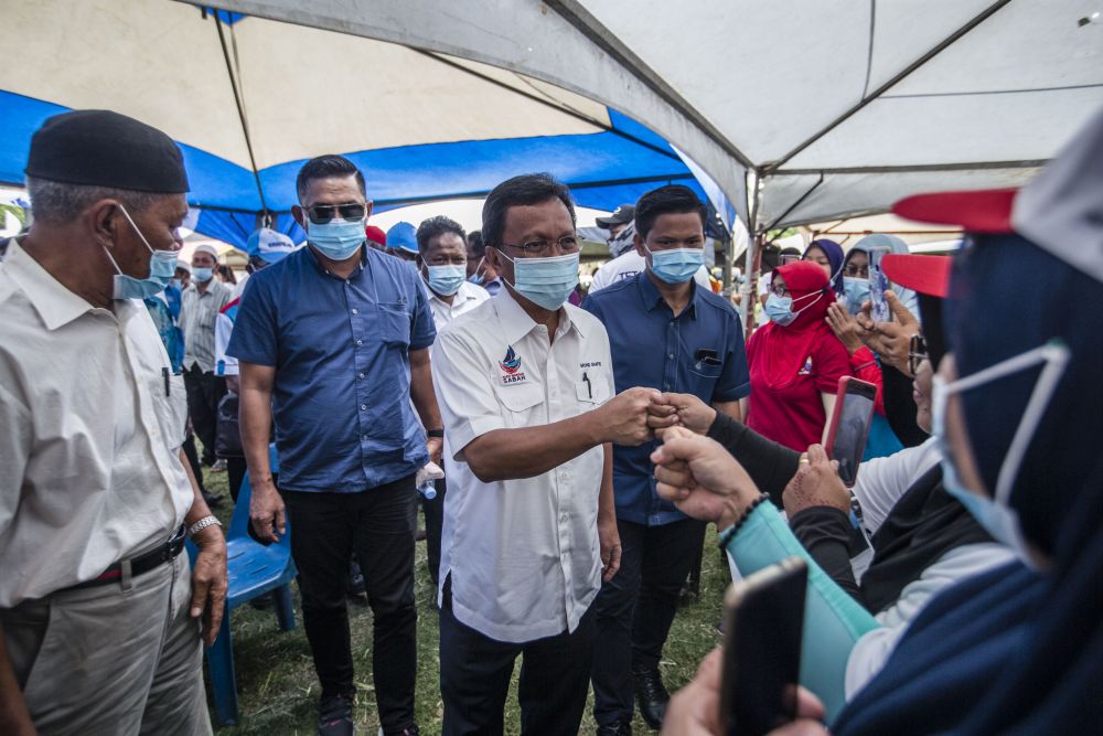 Parti Warisan Sabah president Datuk Seri Mohd Shafie Apdal greets supporters while campaigning in Pintasan, Kota Belud September 16, 2020. u00e2u20acu201d Picture by Firdaus Latif