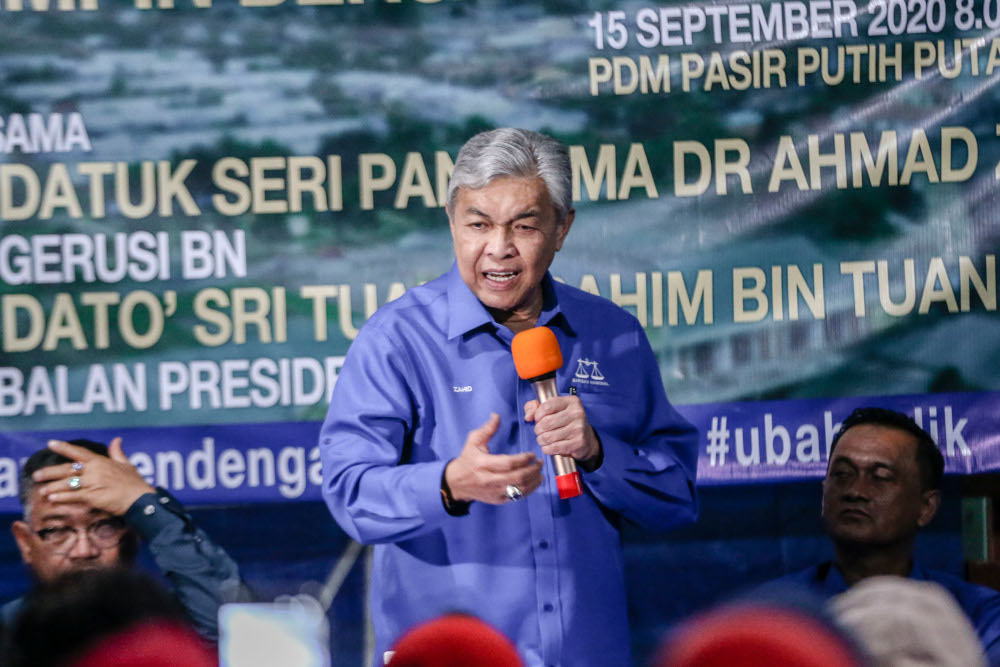 BN chairman Datuk Seri Ahmad Zahid Hamidi speaks while campaigning for Shahelmey Yahaya, BN Tanjung Keramat candidate in Tanjung Keramat, Sabah September 15, 2020. u00e2u20acu201d Picture by Firdaus Latif