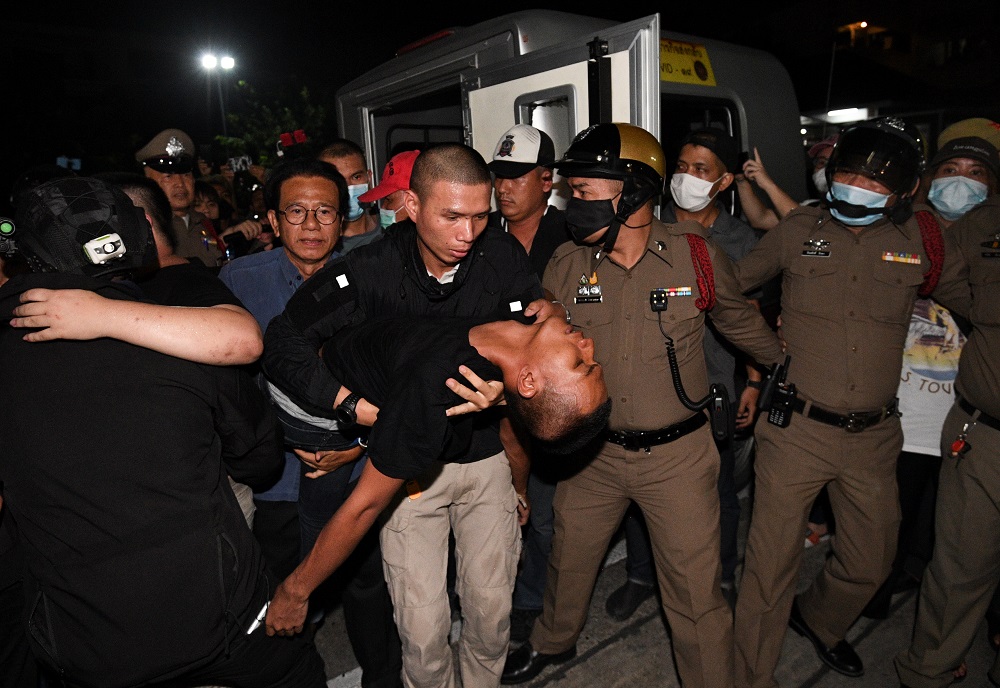 Panupong Jadnok is carried by police at Prachachuen police station in Bangkok October 30, 2020. u00e2u20acu201d Reuters pic