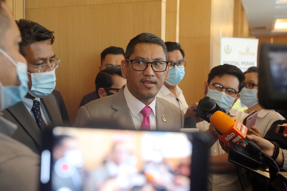 Datuk Seri Ahmad Faizal Azumu speaking to press at the Weil Hotel in Ipoh October 9, 2020. u00e2u20acu201d Picture by Farhan Najibk