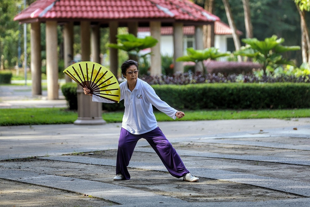 A woman exercises at Taman Rimba Kiara in Kuala Lumpur during the CMCO period October 19, 2020. u00e2u20acu201d Picture by Ahmad Zamzahuri