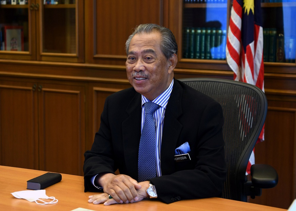 Prime Minister Tan Sri Muhyiddin Yassin while attending the 2021 Budget Briefing via video conferencing at his office in Putrajaya October 27, 2020. u00e2u20acu201d Bernama pic