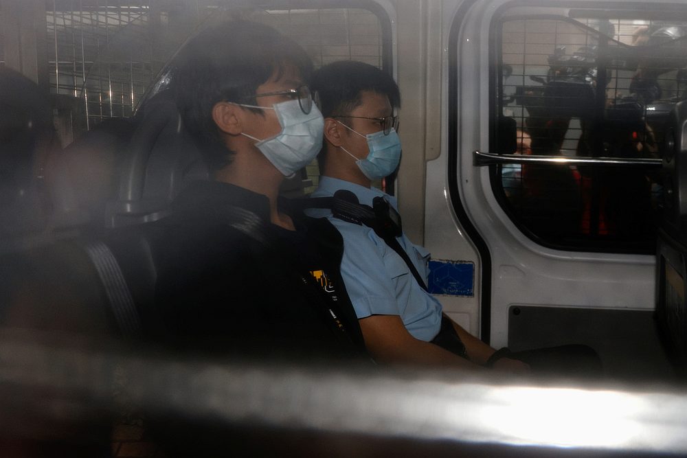Former convenor of pro-independence group Studentlocalism, Tony Chung Hon-lam, arrives at West Kowloon Magistratesu00e2u20acu02dc Courts in a police van in Hong Kong October 29, 2020. u00e2u20acu201d Reuters pic