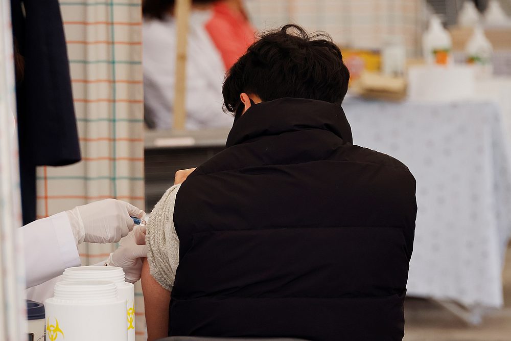 A man gets an influenza vaccine at a hospital in Seoul, South Korea October 21, 2020. u00e2u20acu201d Reuters pic