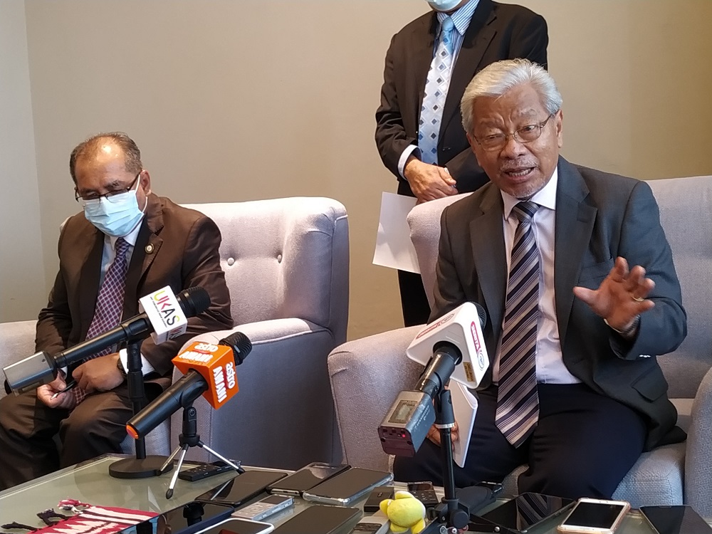 Tan Sri James Masing (right) speaks to reporters after opening a three-day Workshop on Administration of Contracts Towards Project Delivery Excellence for Sarawak Government Projects, October 13, 2020. u00e2u20acu2022 Picture by Sulok Tawie