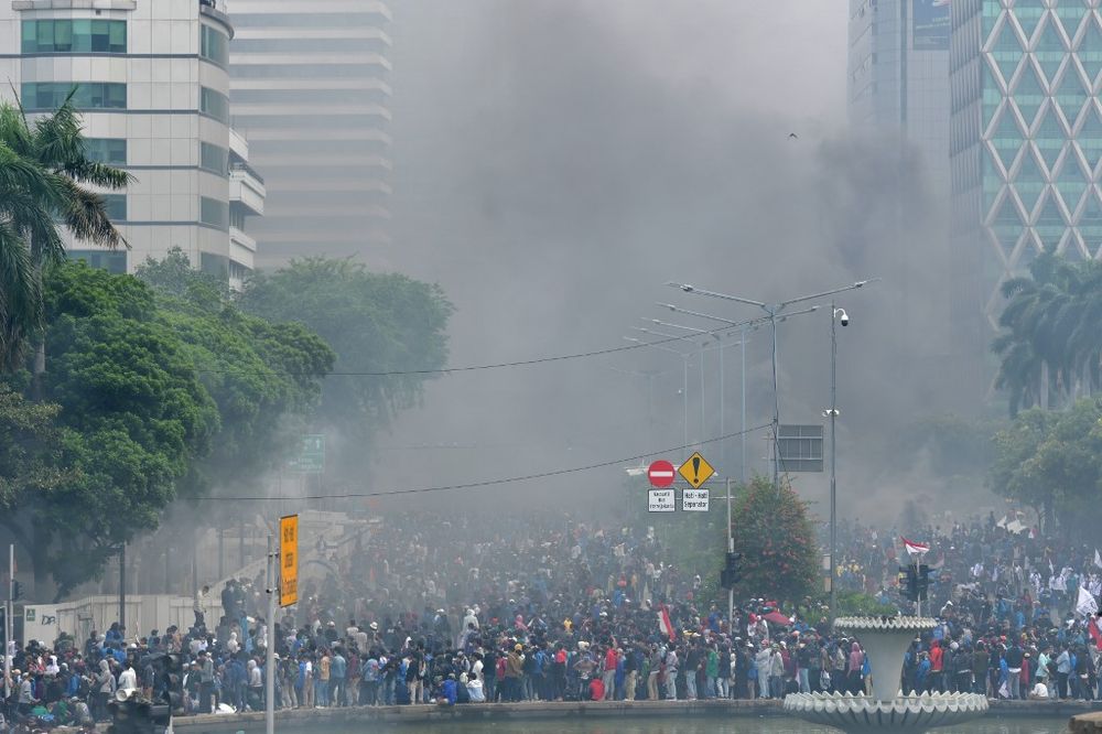 Smoke from fires set by activists rise during the last day of a three-day nationwide strike against a controversial new law which critics fear will favour investors at the expense of labour rights and the environment, in Jakarta, October 8, 2020. u00e2u20acu201d AFP 