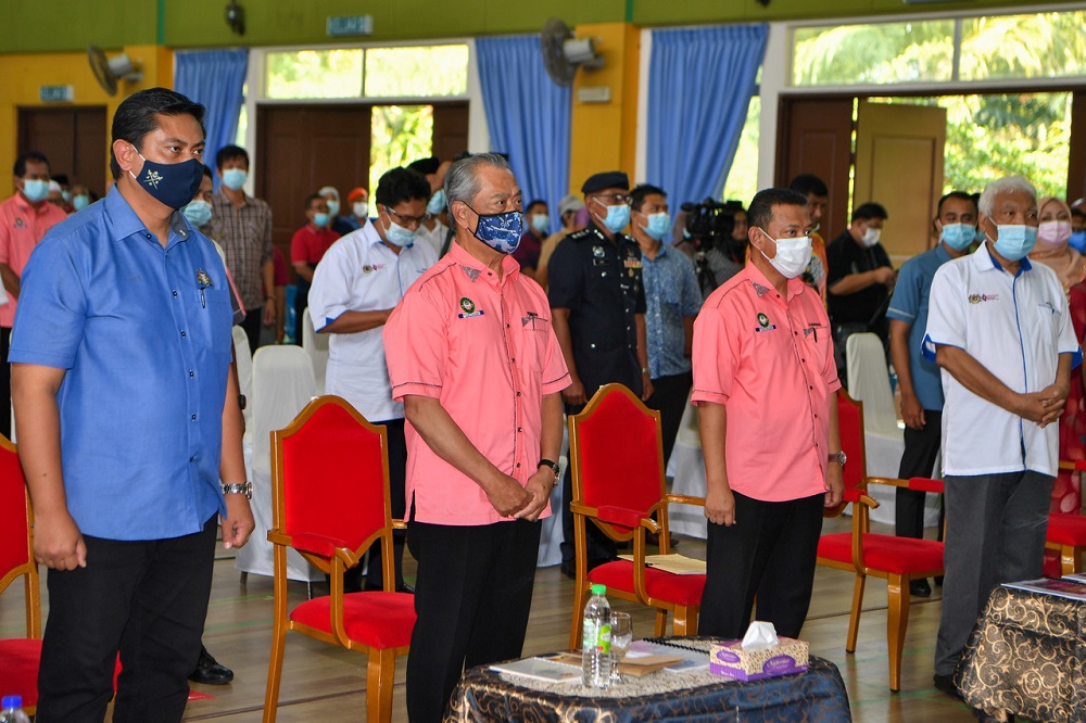 PM Tan Sri Muhyiddin Yassin (second left) attends the 24th annual general meeting of Koperasi Sungai Terap dan Sungai Raya Muar Berhad at Dewan Sri Permata, Sekolah Menengah Kebangsaan (SMK) Bukit Pasir in Muar October 30, 2020. u00e2u20acu2022 Bernama pic