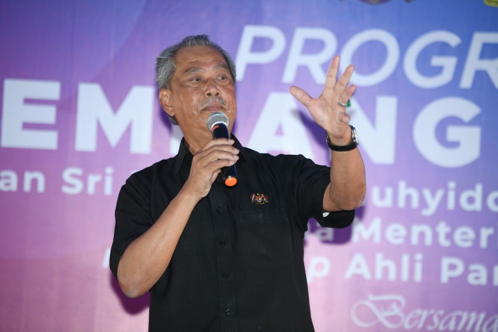 Prime Minister Tan Sri Muhyiddin Yassin delivers a speech during a meet-and-greet event at a restaurant in Pagoh October 30, 2020. u00e2u20acu201d Bernama pic