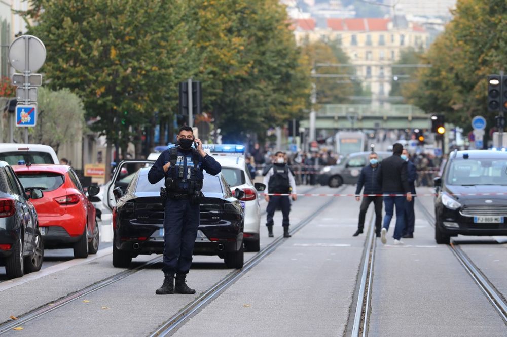 French policemen stand guard a street after a knife attack in Nice on October 29, 2020. A man wielding a knife outside a church slit the throat of one person, leaving another dead and injured several others in an attack. u00e2u20acu201d AFP pic