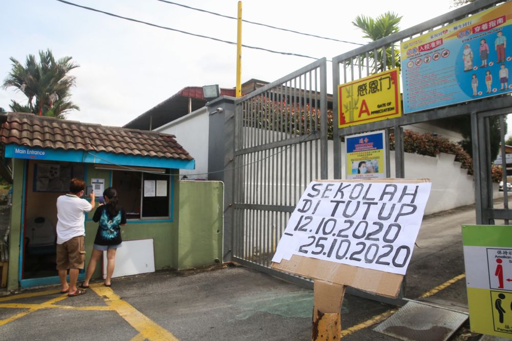 A notice of closure is seen at the entrance of SJK (C) Yak Chee in Puchong October 12, 2020. u00e2u20acu201d Picture by Choo Choy May