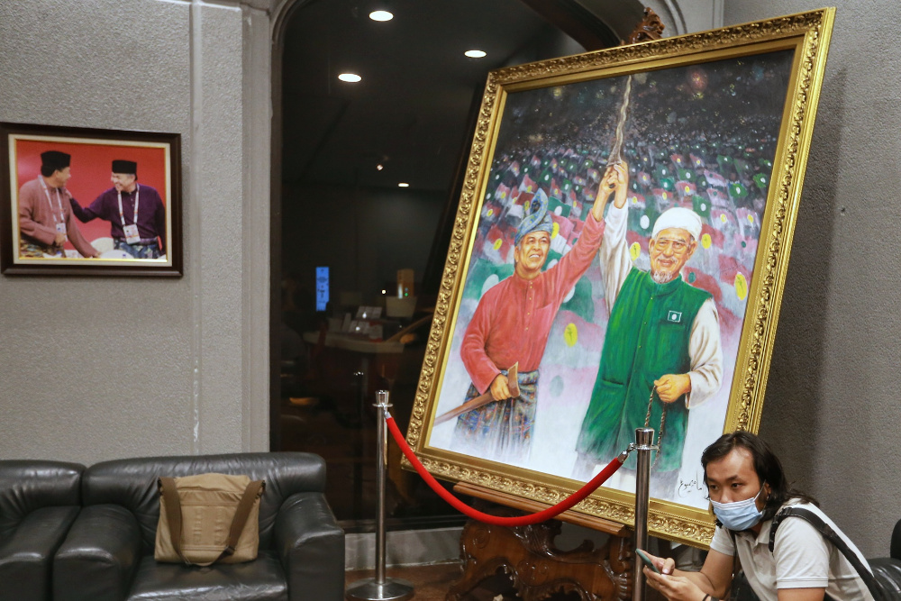 A painting of Umno president Datuk Seri Ahmad Zahidi and PAS president Datuk Seri Abdul Hadi Awang on display at Menara Datou00e2u20acu2122 Onn, October 26, 2020. u00e2u20acu201d Picture by Ahmad Zamzahuri