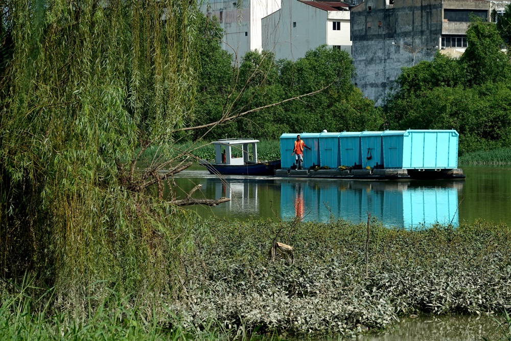 An Interceptor, a floating machine that collects waste from the river, is seen along the Klang River November 5, 2020. u00e2u20acu201d Picture by Miera Zulyana