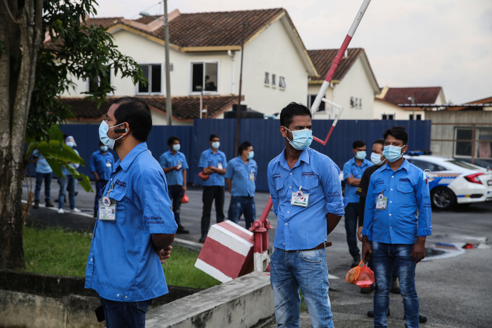 A general view of workers queuing in front of Top Glove Corporation Berhadu00e2u20acu2122s male staff dormitories in Klang November 16, 2020. u00e2u20acu201d Picture by Yusof Mat Isa  