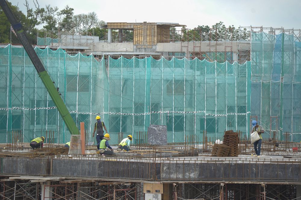 Workers are pictured at a construction site in Kuala Lumpur November 5, 2020. u00e2u20acu201d Picture by Shafwan Zaidon