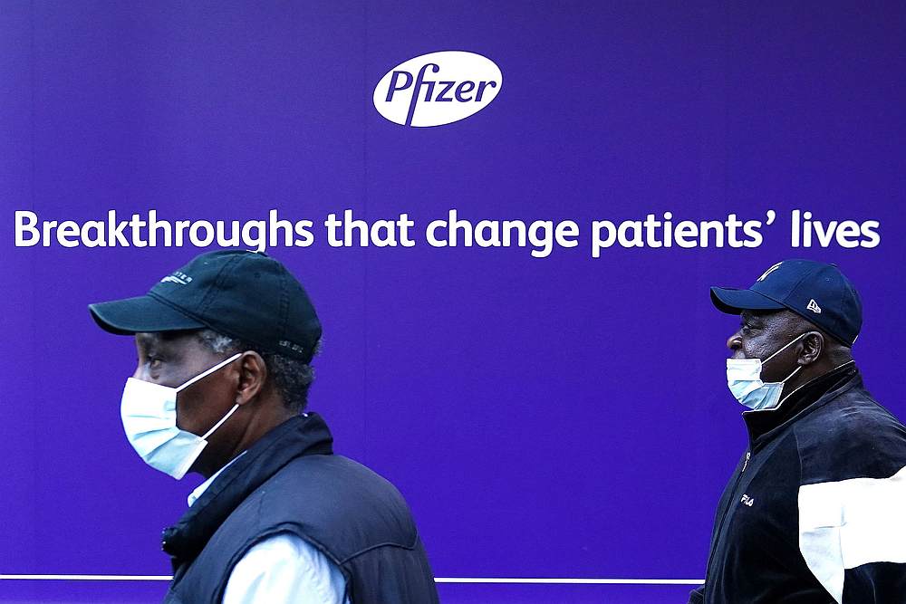 A person walks past the Pfizer Headquarters building in the Manhattan borough of New York November 9, 2020. u00e2u20acu201d Reuters pic